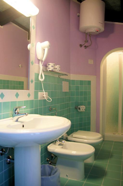 Residence Riva Azzurra Cannigione Phòng bức ảnh